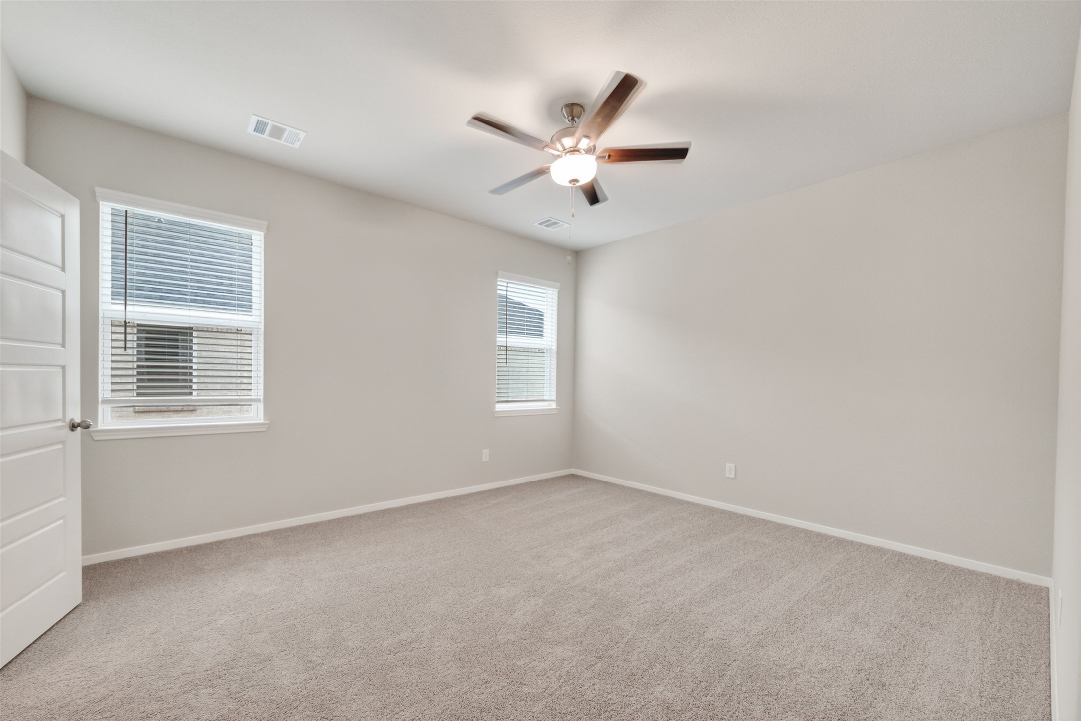 2107 Spring Hollow Drive Baytown, TX 77521 - Photo 20 of 42 a view of an empty room with a window