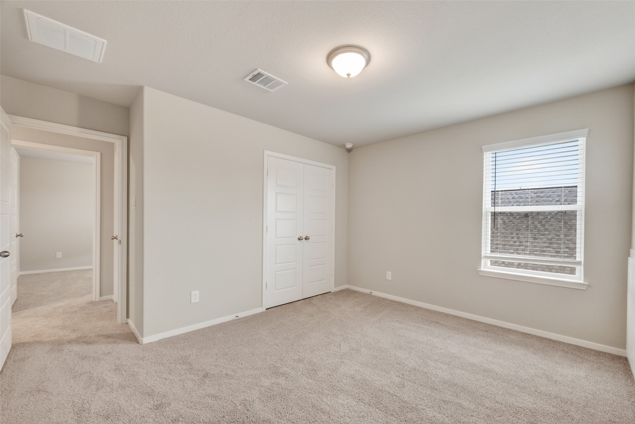 2107 Spring Hollow Drive Baytown, TX 77521 - Photo 37 of 42 an empty room with windows