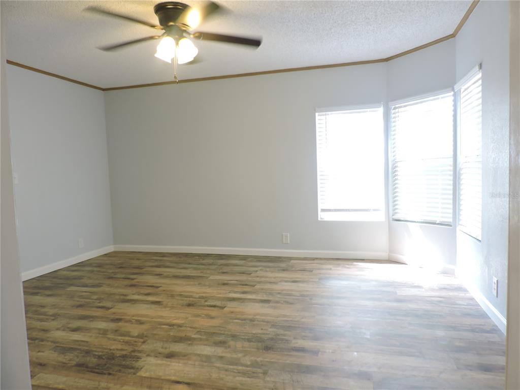 294 Tiger Lake Road Lake Wales, FL 33898 - Photo 22 of 56 a view of an empty room with a window