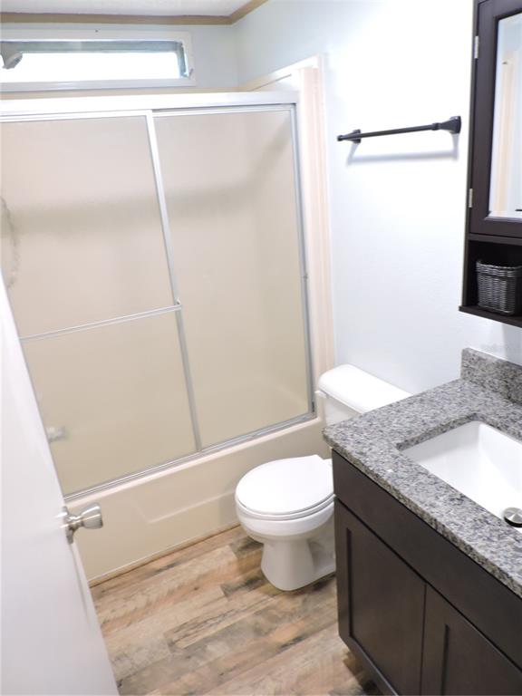 294 Tiger Lake Road Lake Wales, FL 33898 - Photo 34 of 56 a bathroom with a granite countertop sink toilet and shower