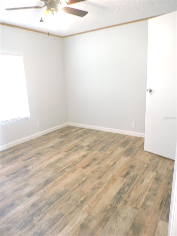 294 Tiger Lake Road Lake Wales, FL 33898 - Photo 36 of 56 a view of a small space with wooden floor