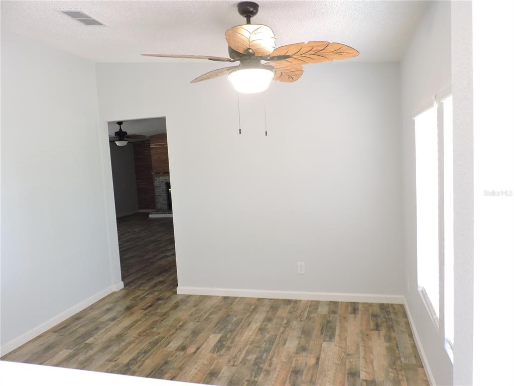 294 Tiger Lake Road Lake Wales, FL 33898 - Photo 9 of 56 a view of empty room with wooden floor