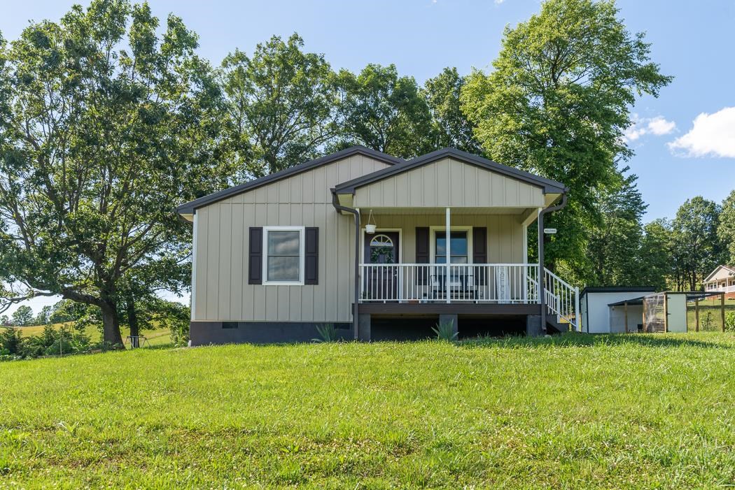 471 Shirey Road Swoope, VA 24479 - Photo 1 of 75 a aerial view of a house next to a big yard and large trees