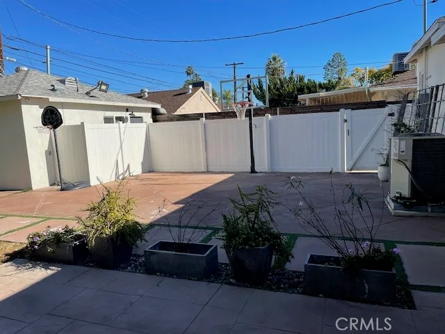 a view of backyard with green space