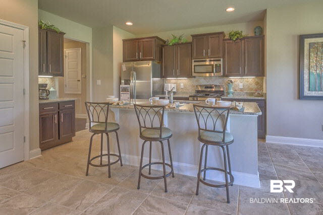 10438 Dunmore Drive Daphne, AL 36526 - Photo 2 of 24 Please note the home shown in this photo is of a staged model home for this floor plan. All items and options in this photo may, or may not, be available in Dunmore.