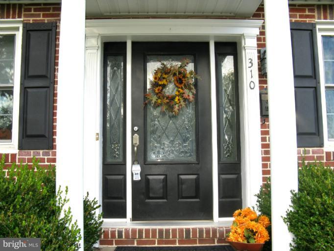 310 Greenwood Road Linthicum, MD 21090 - Photo 2 of 26 a view of a balcony door and dining room