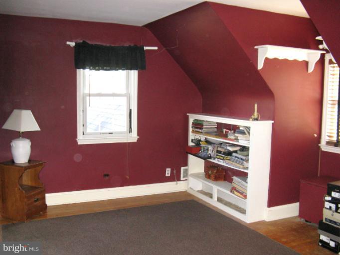 310 Greenwood Road Linthicum, MD 21090 - Photo 19 of 26 a room with furniture and a window