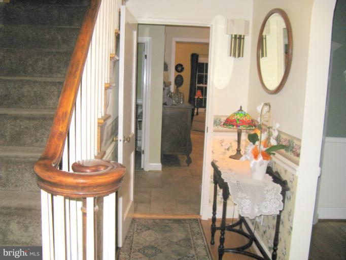 310 Greenwood Road Linthicum, MD 21090 - Photo 3 of 26 a view of a hallway with windows