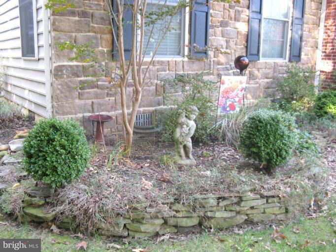 310 Greenwood Road Linthicum, MD 21090 - Photo 23 of 26 a backyard of a house with lots of green space
