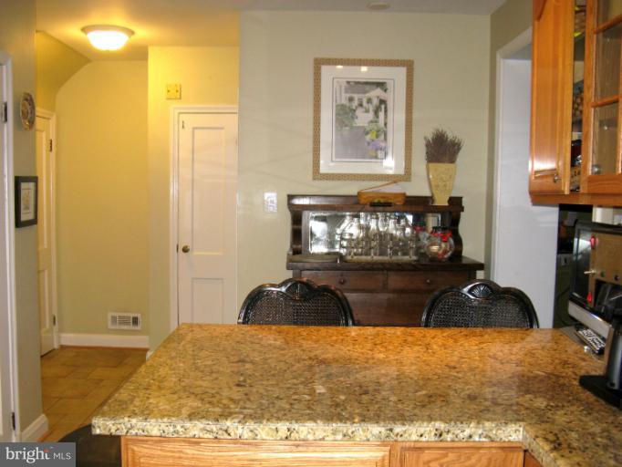 310 Greenwood Road Linthicum, MD 21090 - Photo 6 of 26 a bedroom with a bed and a window