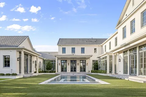 a view of a house with a swimming pool