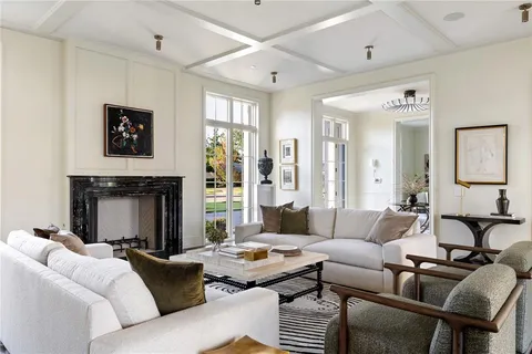 a view of a hallway with a chandelier