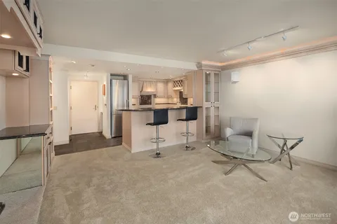 a living room with furniture and a table