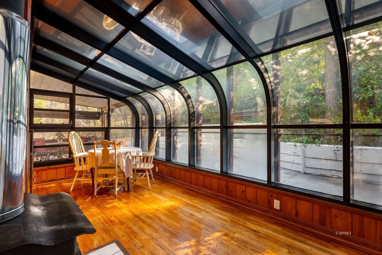 52805 Idyllmont Road Idyllwild, CA 92549 - Photo 16 of 53 a view of a living room with furniture and floor to ceiling window