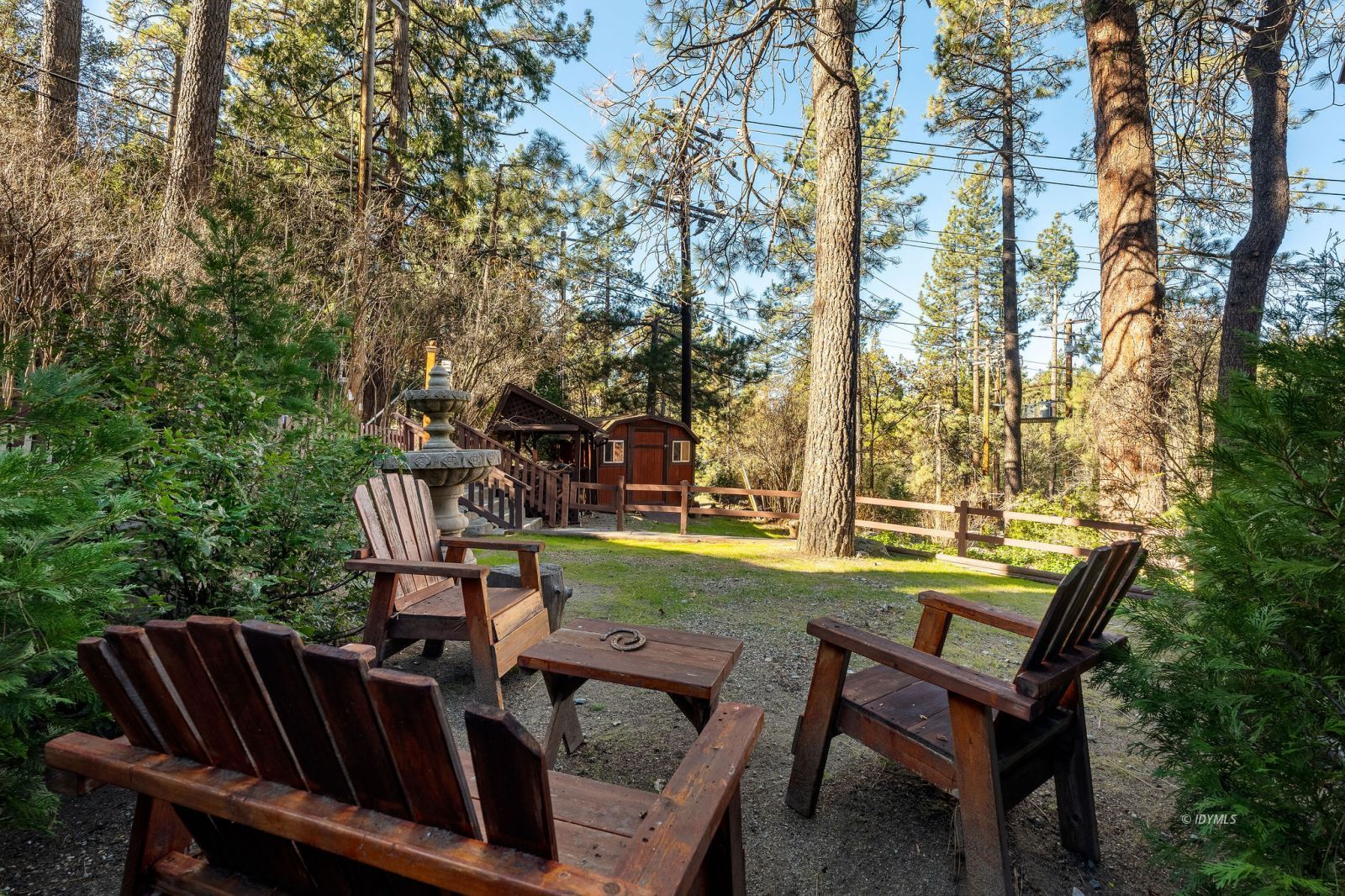52805 Idyllmont Road Idyllwild, CA 92549 - Photo 2 of 53 a view of a chairs and table in the patio