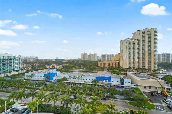 a view of a city with tall buildings