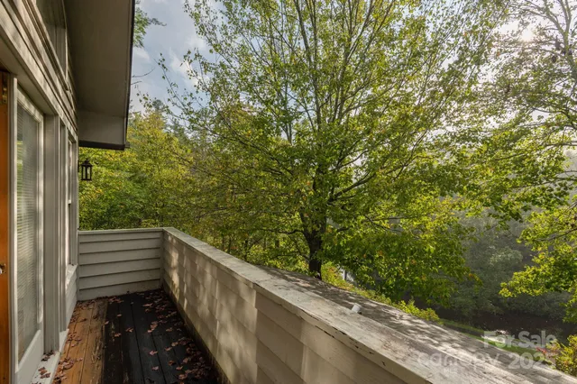 a view of a balcony with an outdoor space
