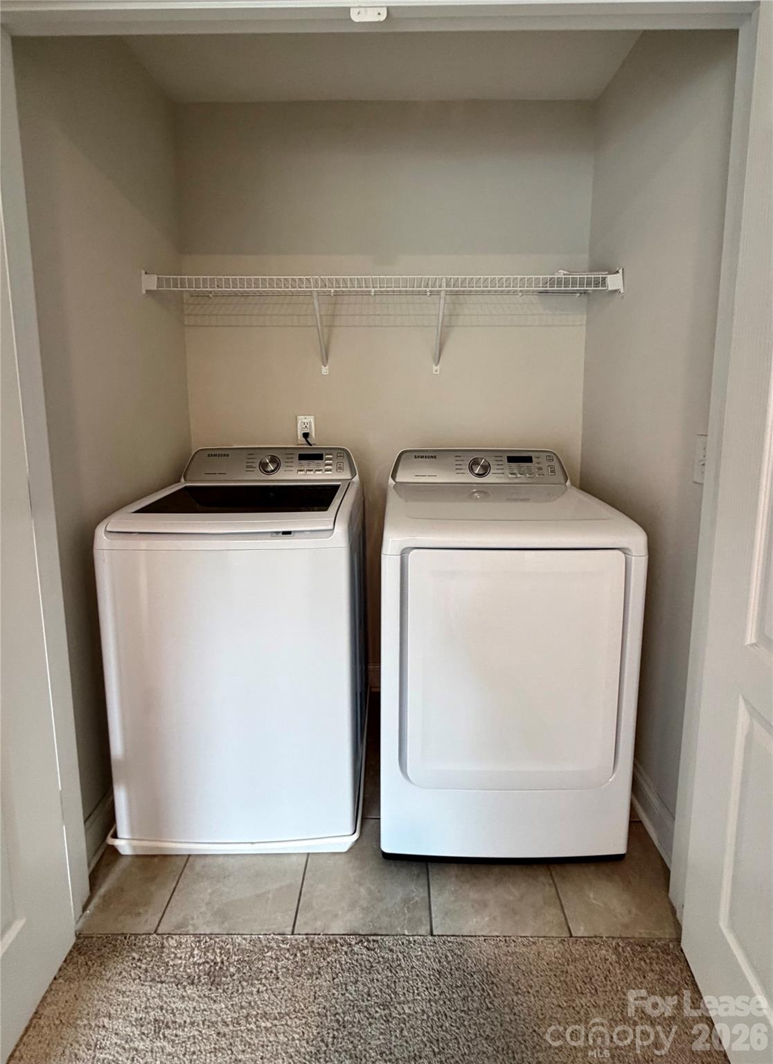 1220 Pecan Ridge Road Fort Mill, SC 29715 - Photo 20 of 25 a utility room with wooden floor washer and dryer