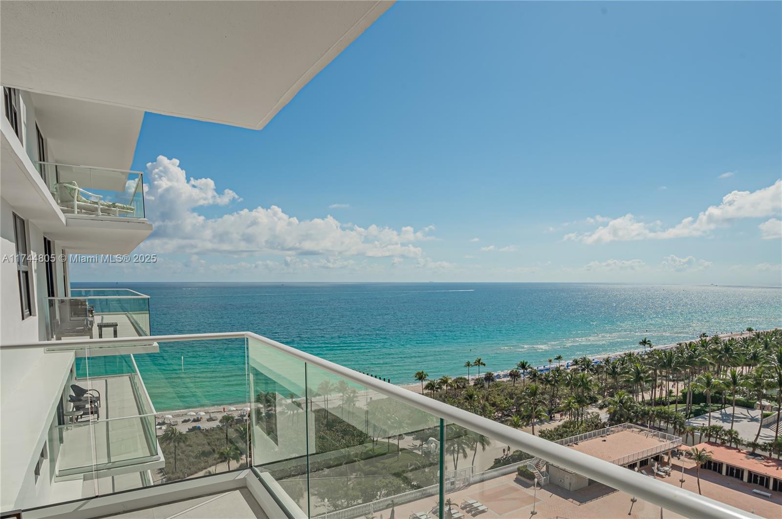 9801 Collins Avenue, Unit 14D Bal Harbour, FL 33154 - Photo 2 of 25 a view of a balcony with an ocean view