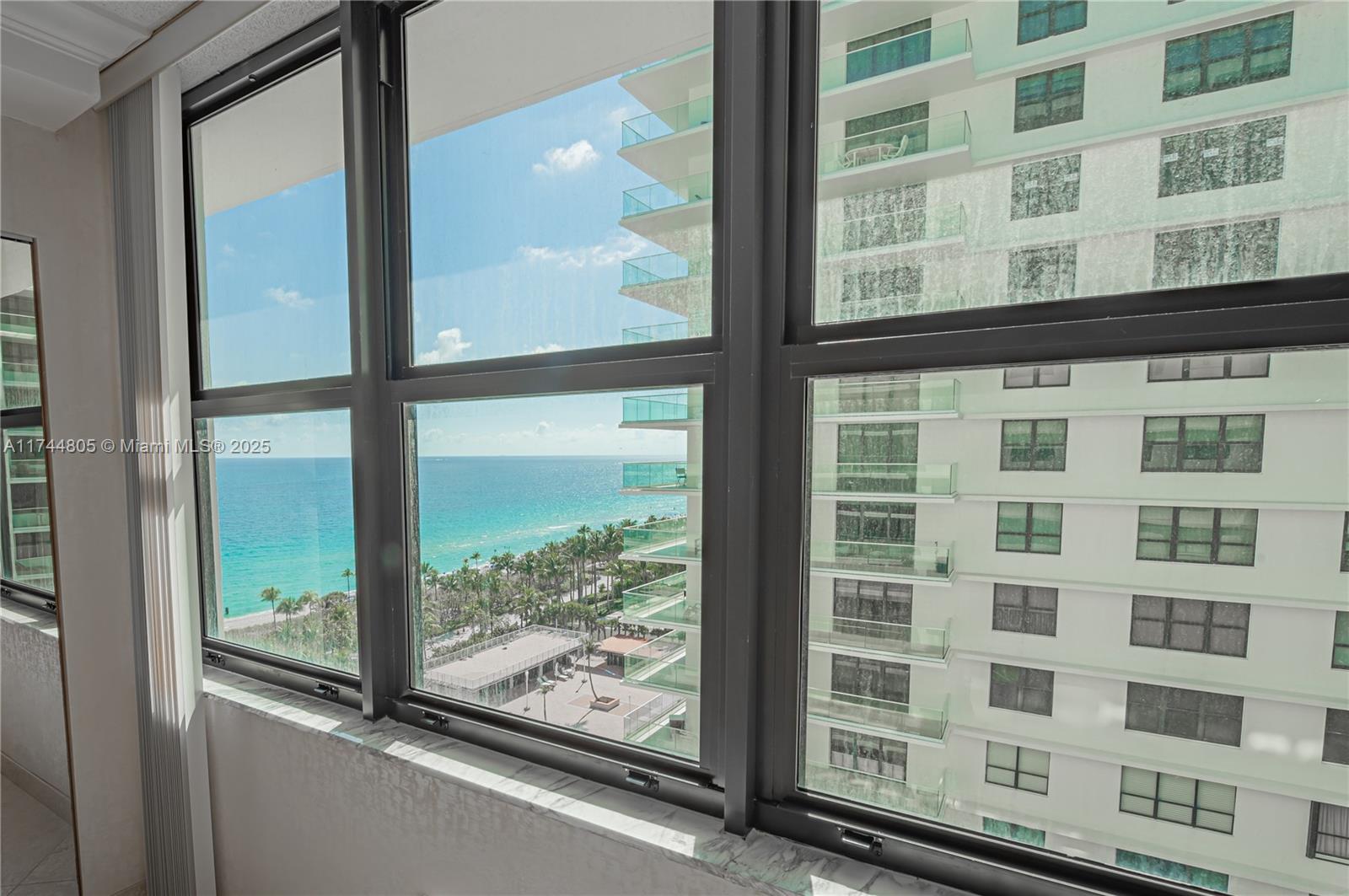 9801 Collins Avenue, Unit 14D Bal Harbour, FL 33154 - Photo 21 of 25 a view of a building from a window