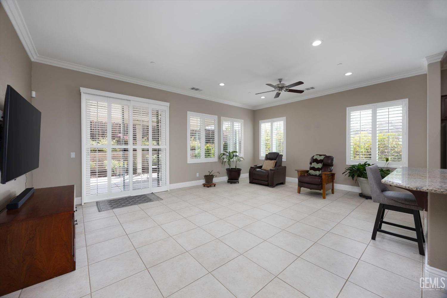 Undisclosed Address Bakersfield, CA 93306 - Photo 12 of 70 a view of a livingroom with workspace and a window