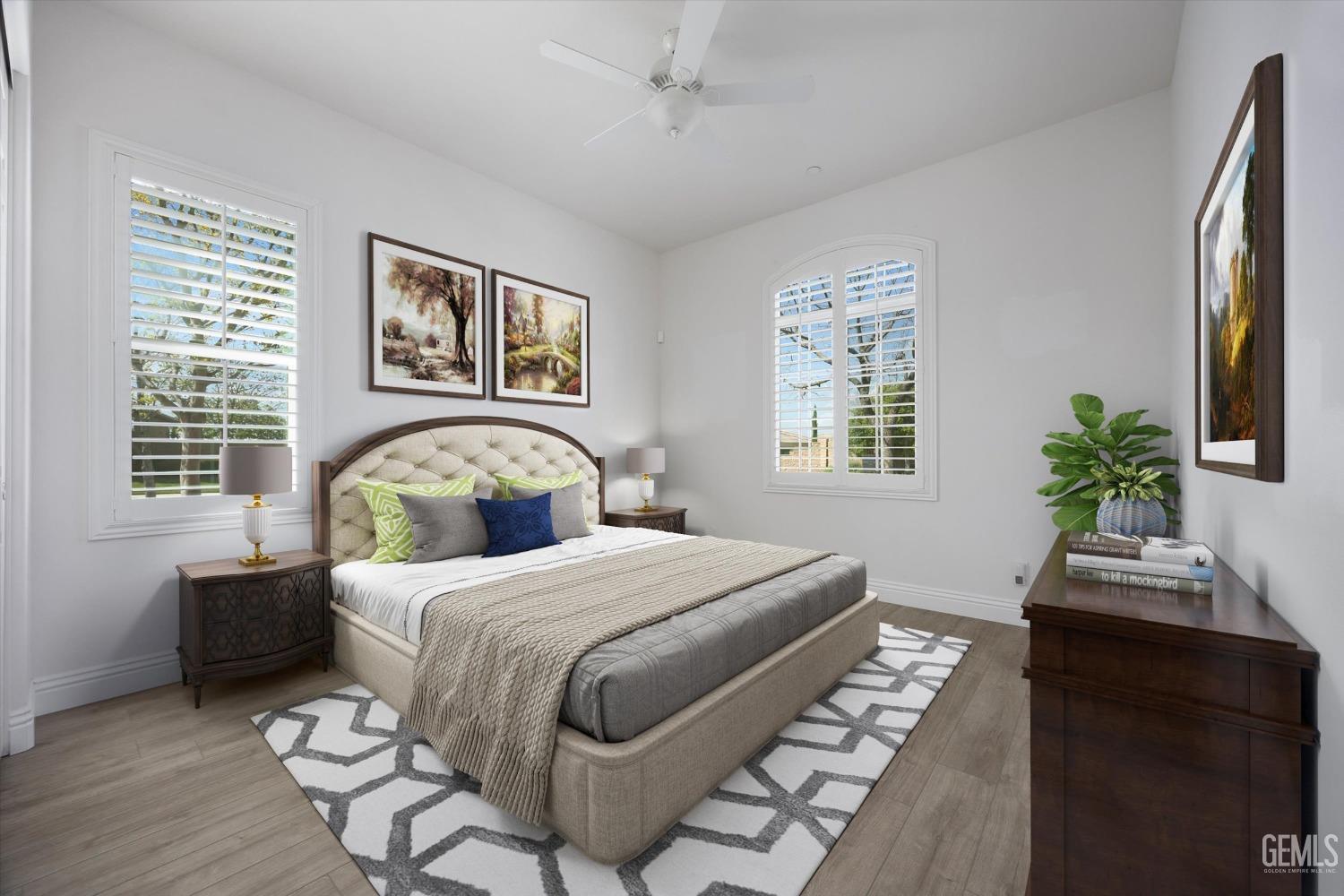Undisclosed Address Bakersfield, CA 93306 - Photo 23 of 70 a bedroom with a bed table chair and a window