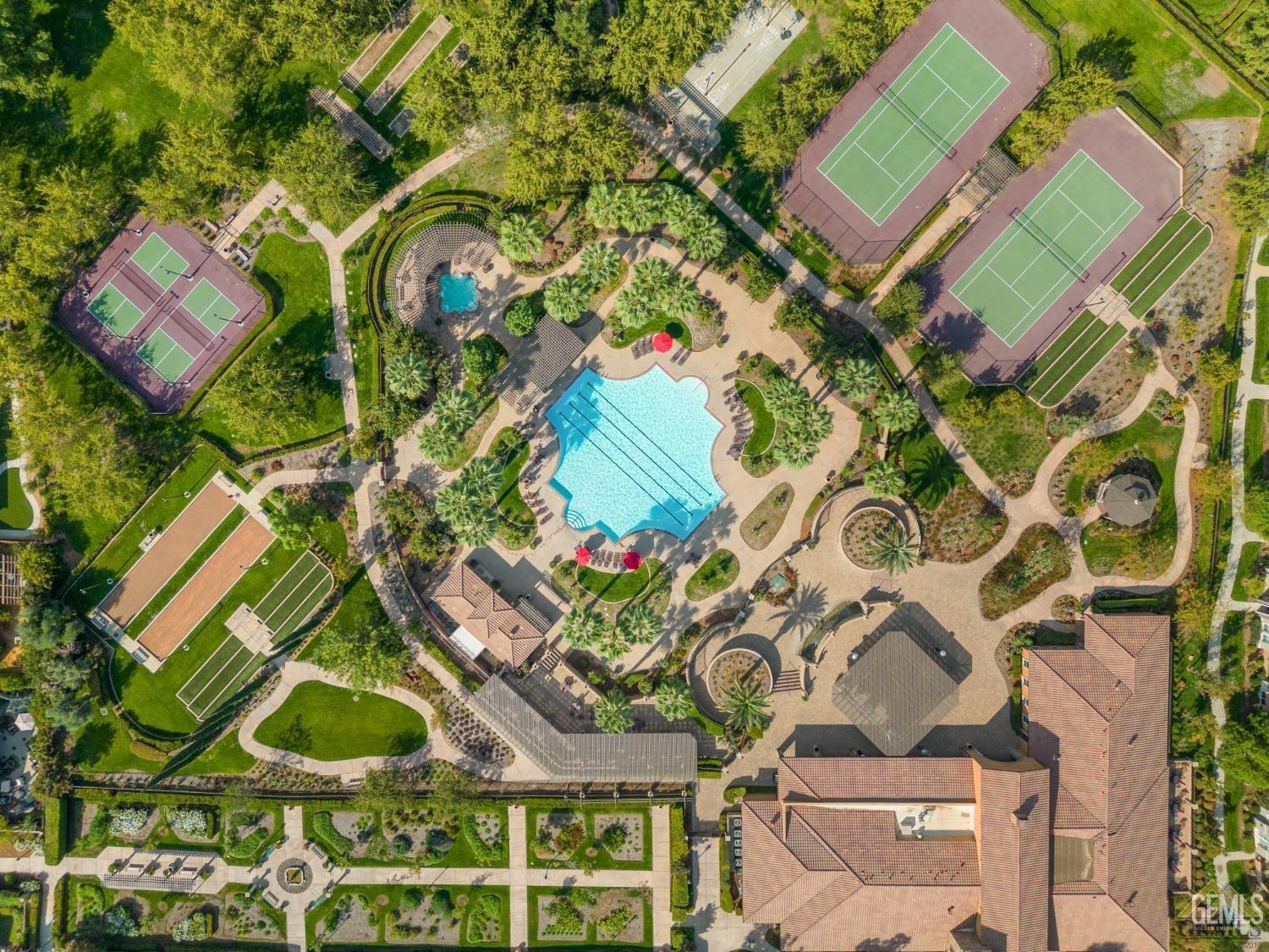 Undisclosed Address Bakersfield, CA 93306 - Photo 46 of 70 an aerial view of a house with a yard and potted plants