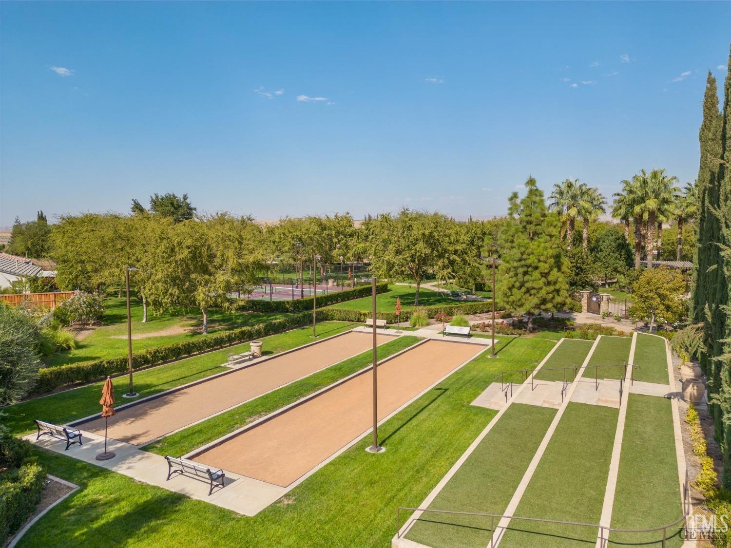 Undisclosed Address Bakersfield, CA 93306 - Photo 50 of 70 a view of an outdoor space and swimming pool