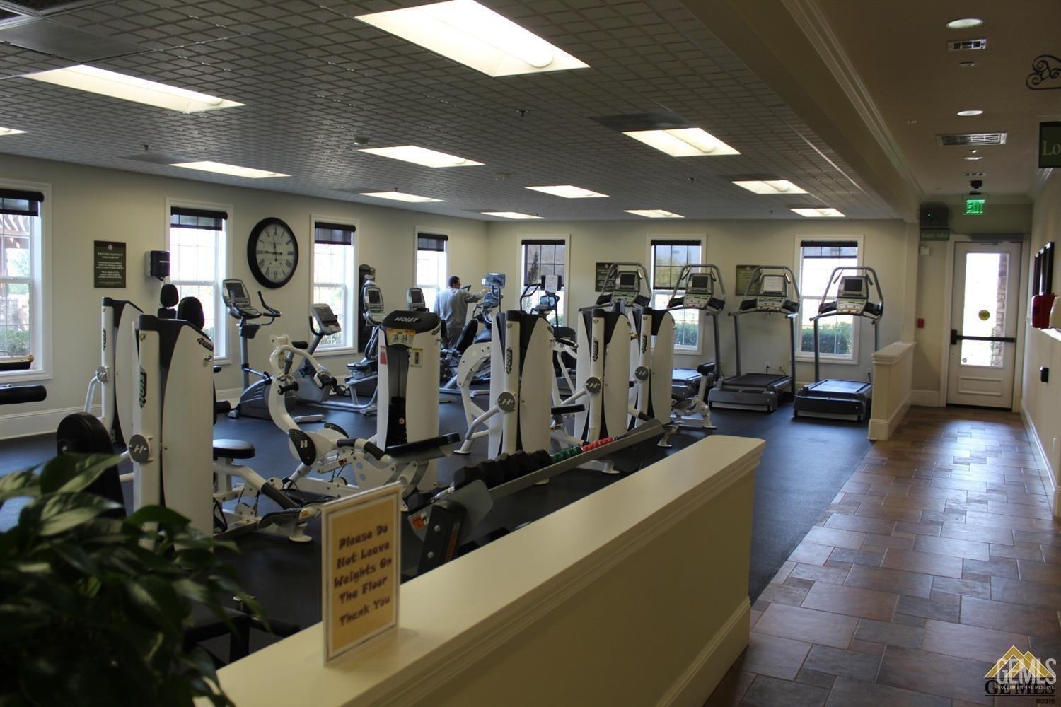 Undisclosed Address Bakersfield, CA 93306 - Photo 61 of 70 a view of a room with gym equipment
