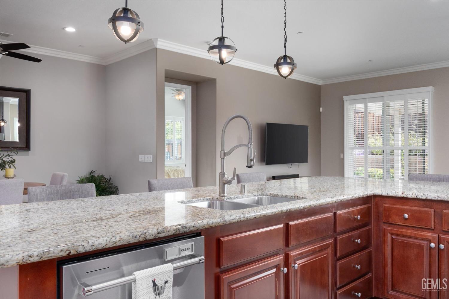 Undisclosed Address Bakersfield, CA 93306 - Photo 8 of 70 a bathroom with a granite countertop sink and a large mirror