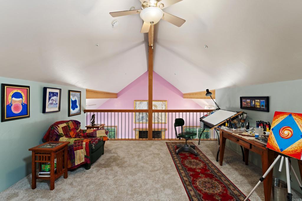 25770 East Grade Road Santa Ysabel, CA 92070 - Photo 28 of 75 a bedroom with furniture and a book shelf