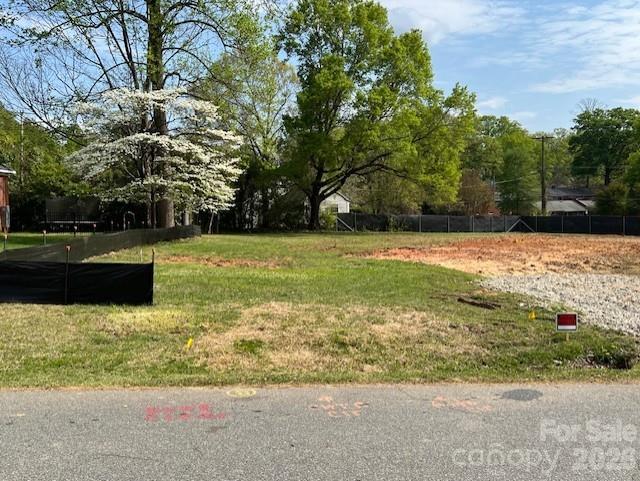 a view of a yard with an outdoor space