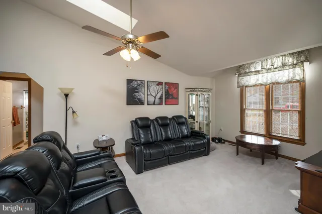 a view of a a dining room with furniture window and outside view