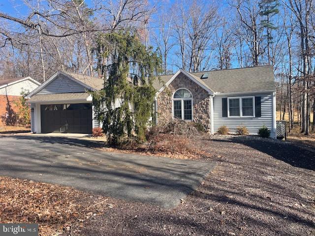 117 Green Street Locust Grove, VA 22508 - Photo 3 of 63 a front view of a house with a yard and garage