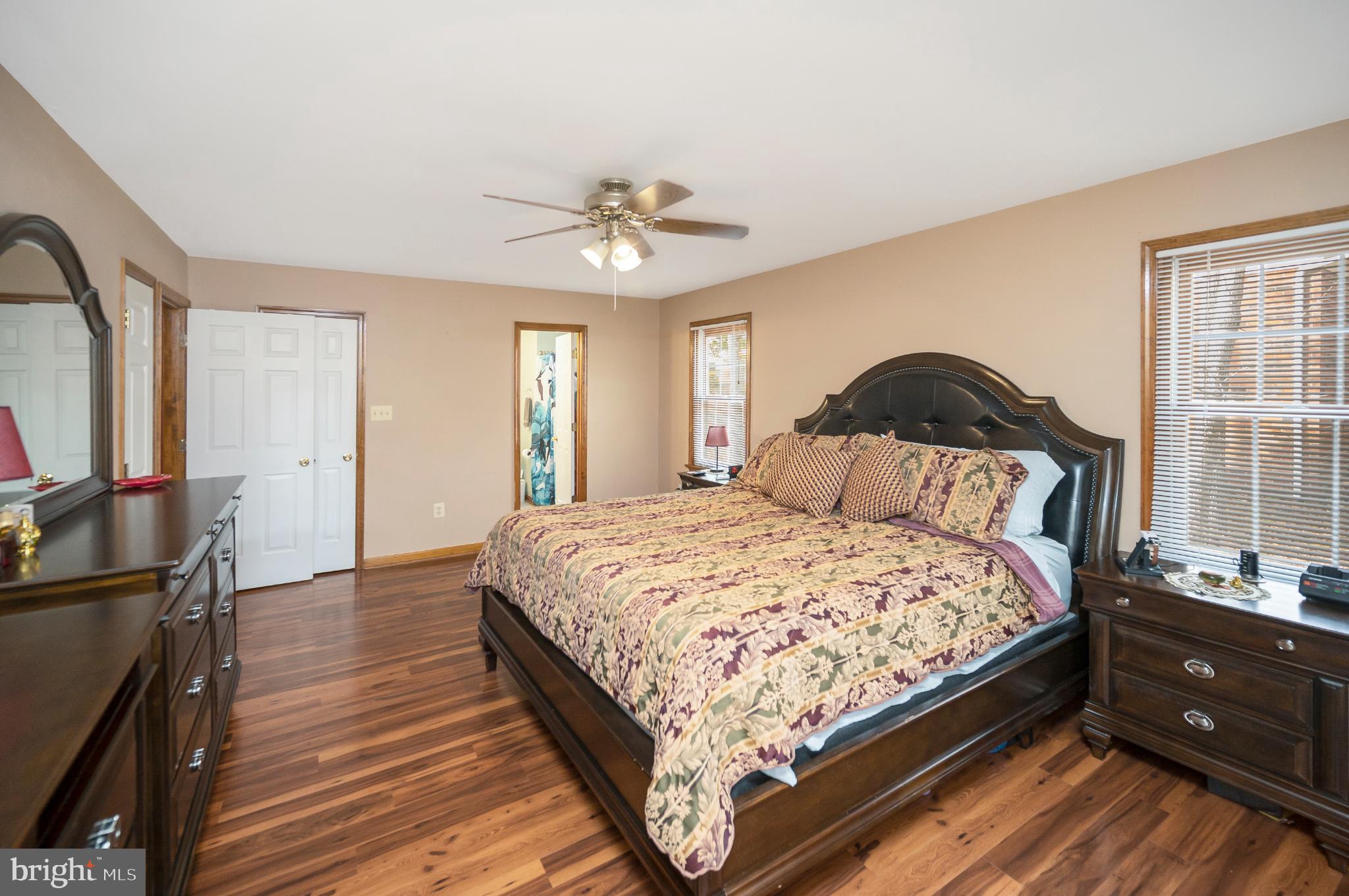 117 Green Street Locust Grove, VA 22508 - Photo 38 of 63 a bedroom with a bed and wooden floor