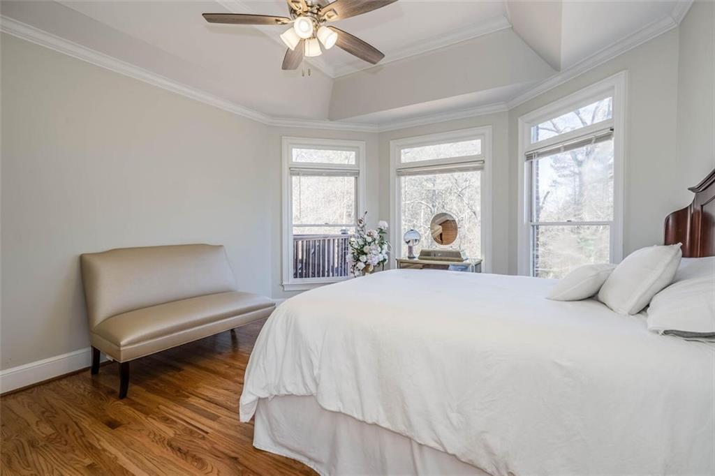 11 Bridgeview Drive Southeast Rome, GA 30161 - Photo 1 of 1 a bedroom with a bed and a chandelier