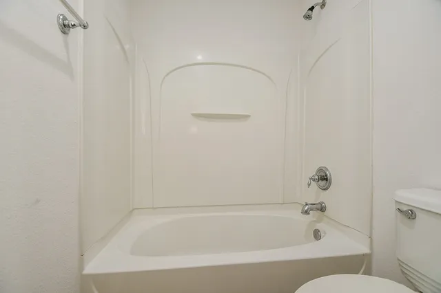 a bathroom with a bathtub
