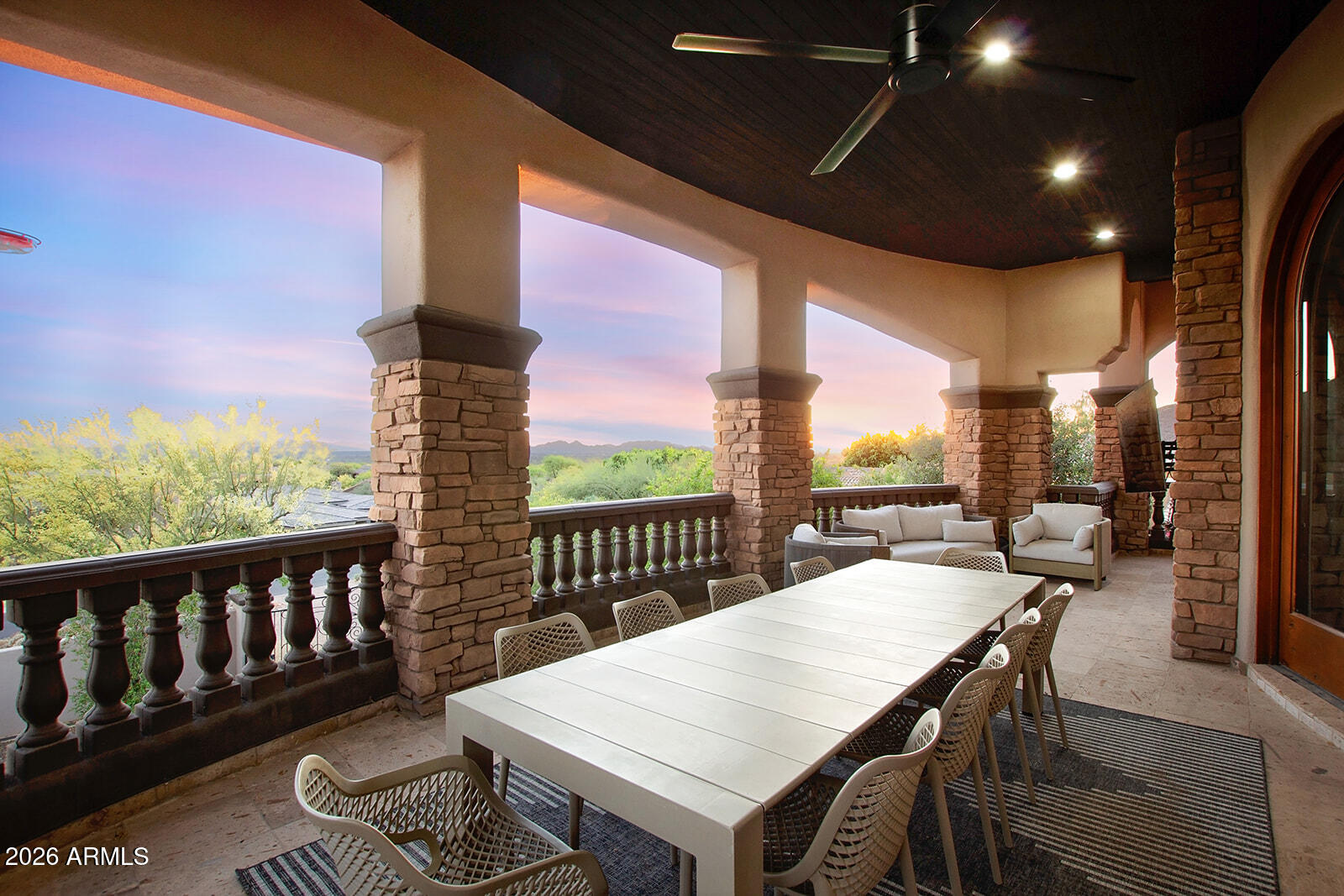 11861 East Desert Trail Road Scottsdale, AZ 85259 - Photo 17 of 63 a view of a balcony with furniture