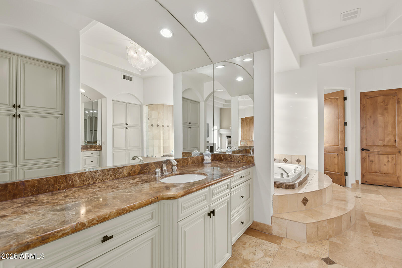 11861 East Desert Trail Road Scottsdale, AZ 85259 - Photo 21 of 63 a spacious bathroom with a granite countertop sink mirror and shower