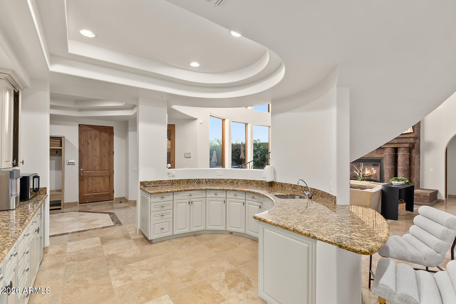 11861 East Desert Trail Road Scottsdale, AZ 85259 - Photo 31 of 63 a spacious bathroom with a granite countertop sink and a mirror