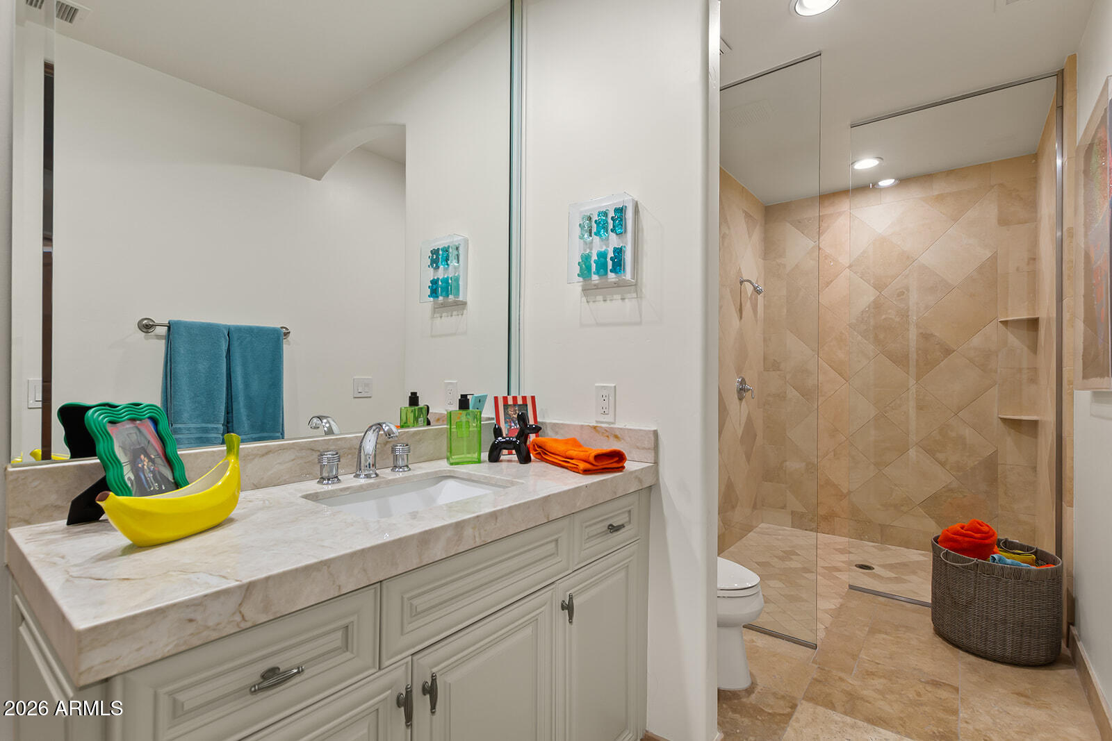 11861 East Desert Trail Road Scottsdale, AZ 85259 - Photo 34 of 63 a bathroom with a sink vanity mirror and shower