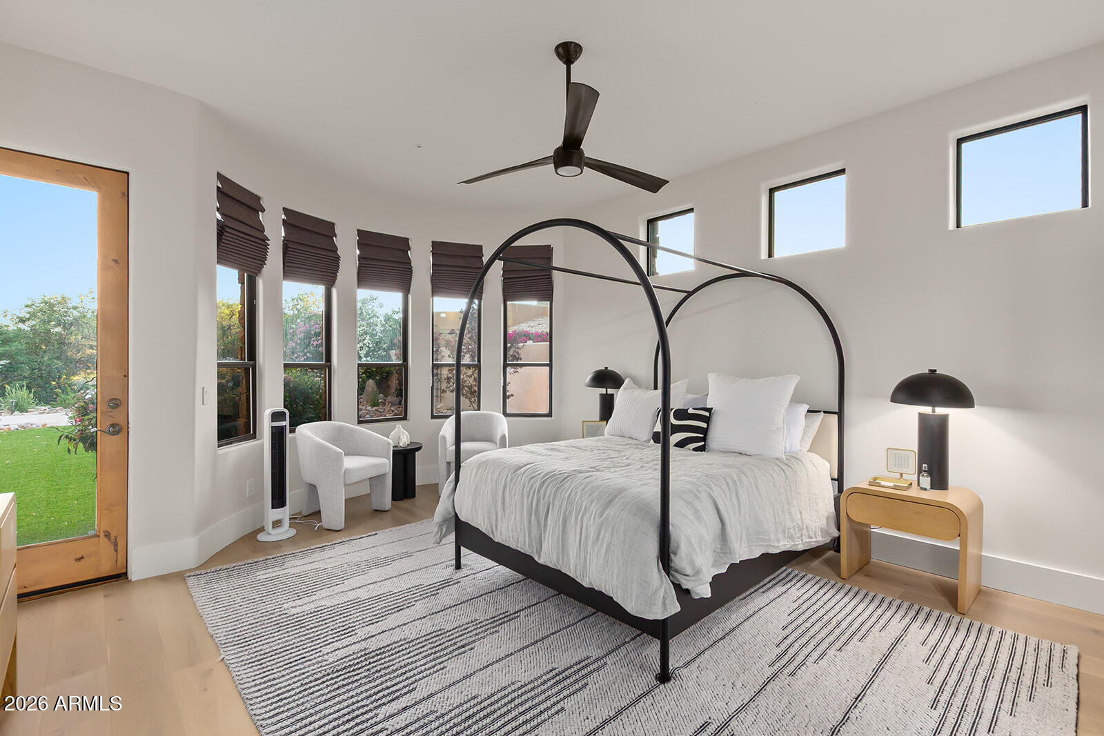 11861 East Desert Trail Road Scottsdale, AZ 85259 - Photo 40 of 63 a bedroom with bed and a large window