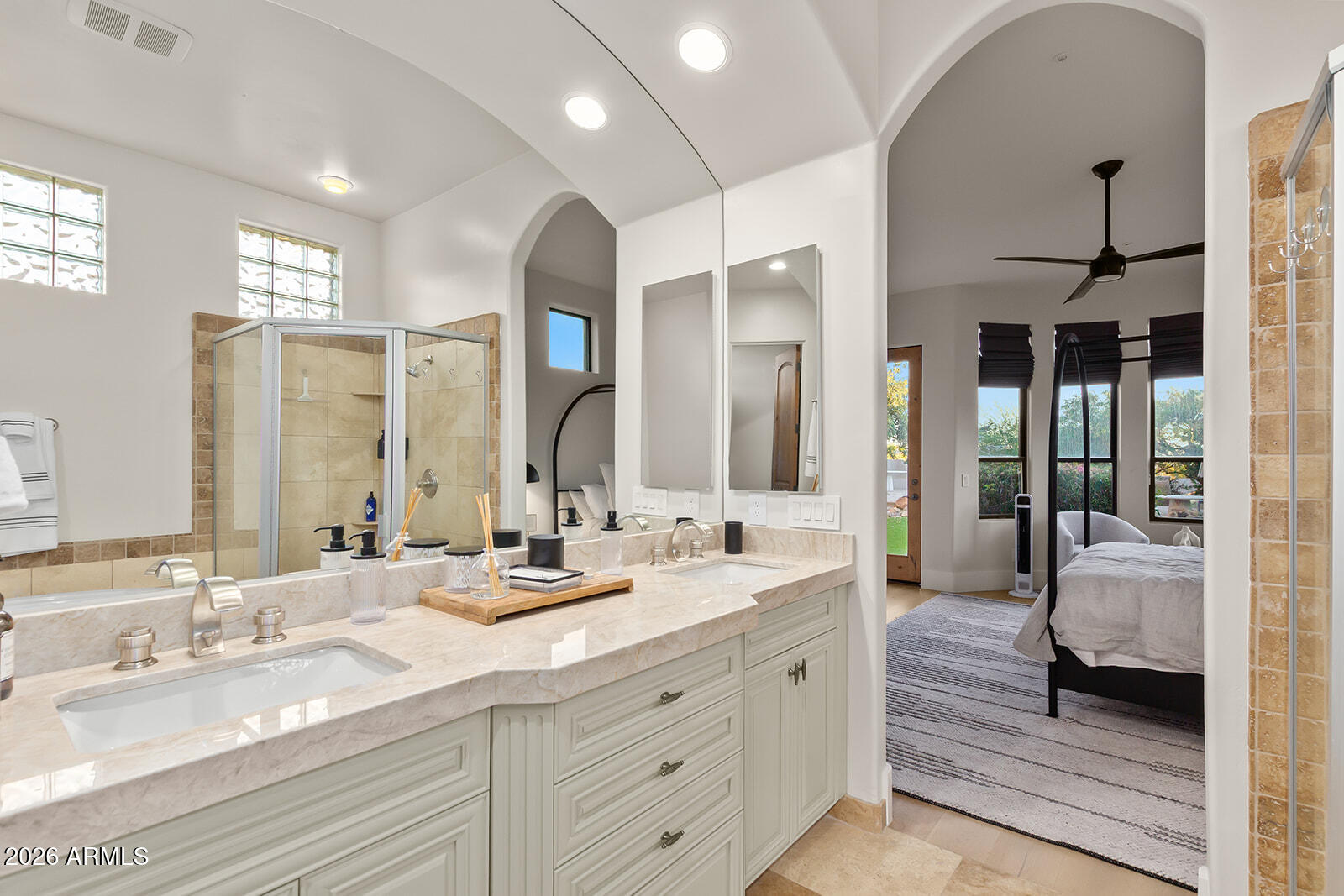 11861 East Desert Trail Road Scottsdale, AZ 85259 - Photo 41 of 63 a spacious bathroom with a double vanity sink and a mirror