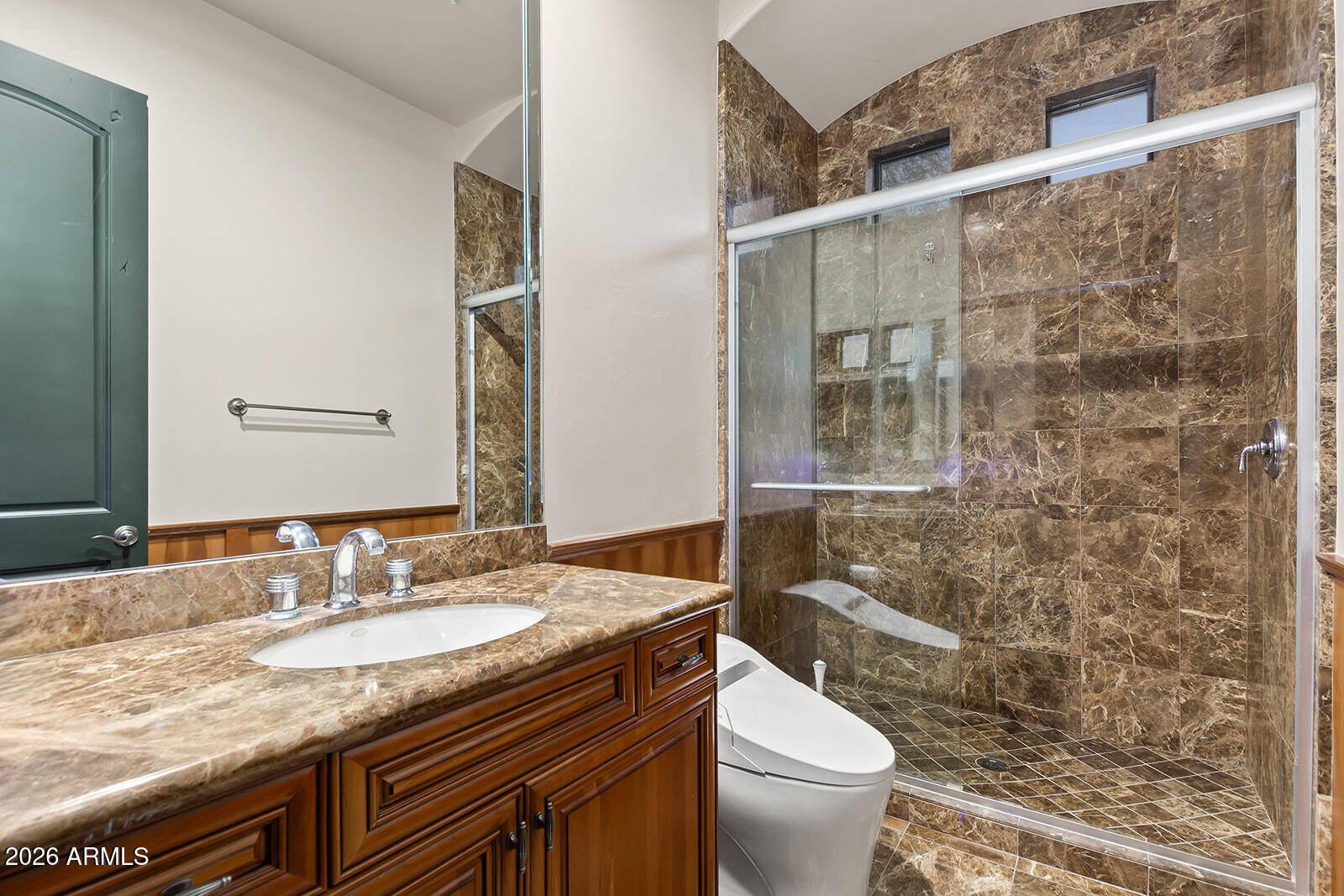 11861 East Desert Trail Road Scottsdale, AZ 85259 - Photo 44 of 63 a bathroom with a granite countertop sink toilet and shower