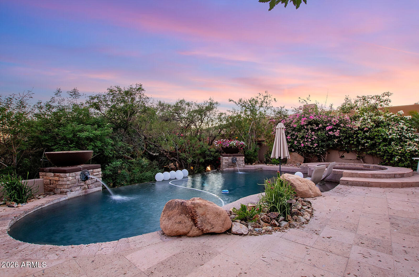 11861 East Desert Trail Road Scottsdale, AZ 85259 - Photo 49 of 63 a view of a backyard with sitting area