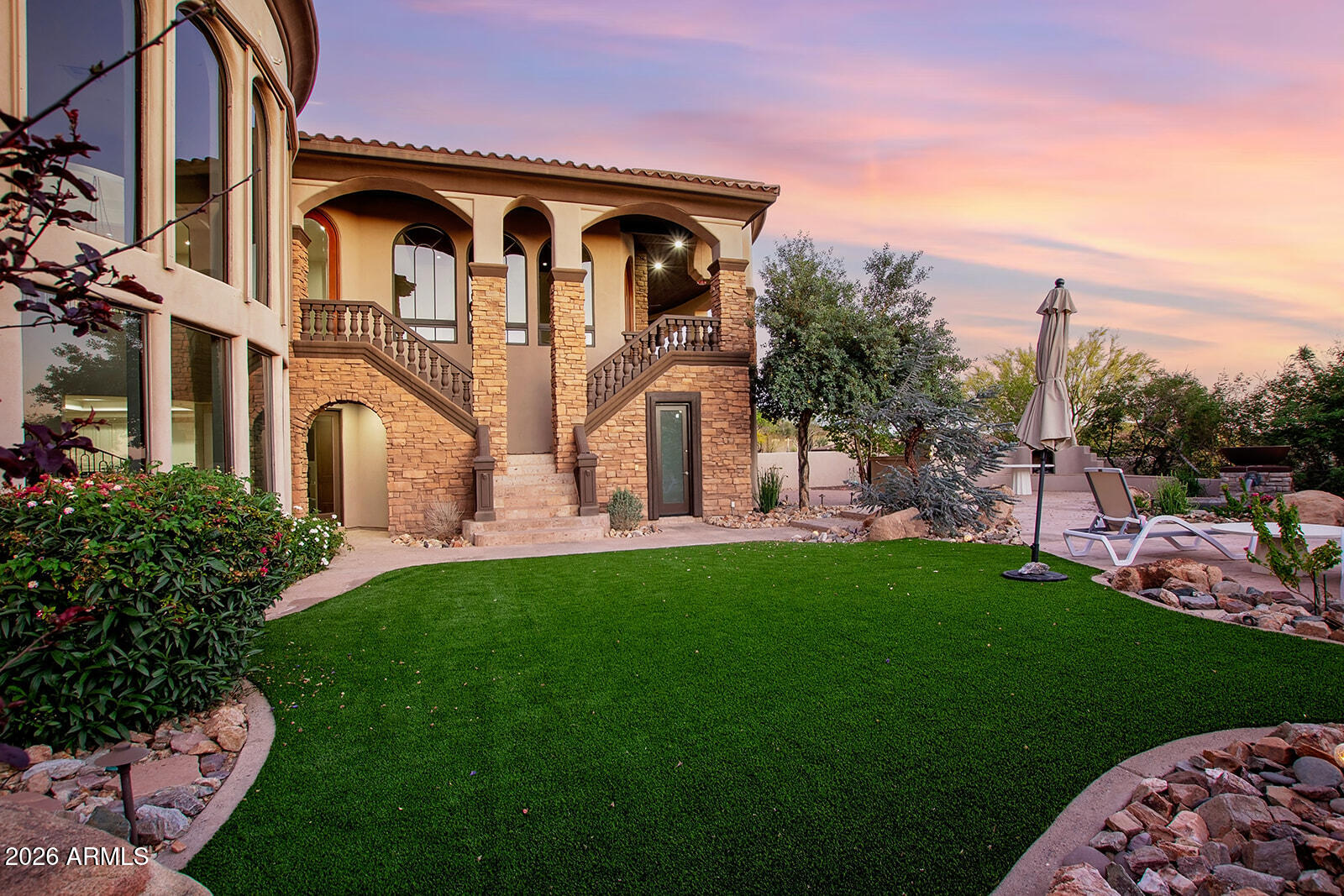 11861 East Desert Trail Road Scottsdale, AZ 85259 - Photo 52 of 63 a front view of a house with garden