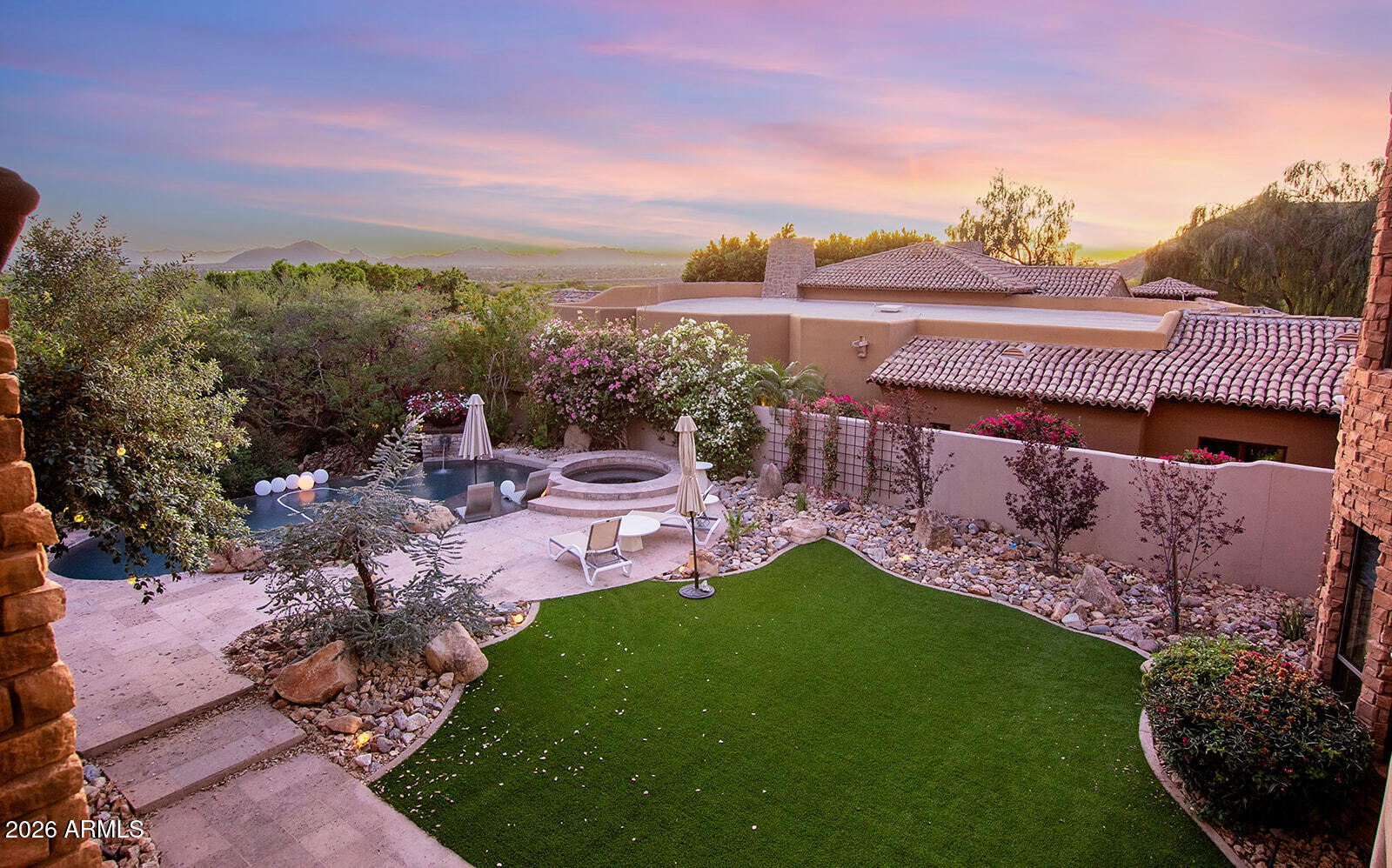 11861 East Desert Trail Road Scottsdale, AZ 85259 - Photo 55 of 63 a view of a patio with furniture and a garden