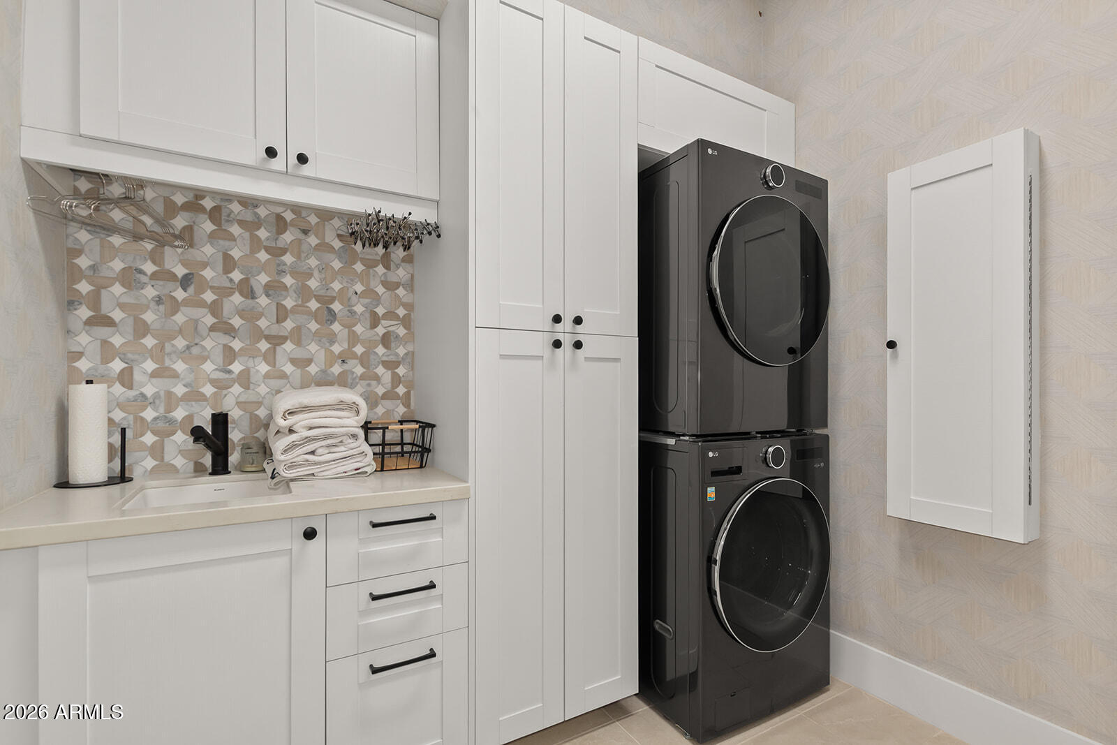 11861 East Desert Trail Road Scottsdale, AZ 85259 - Photo 60 of 63 a utility room with sink dryer and washer