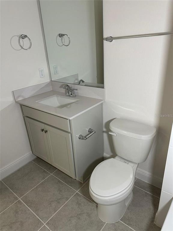 4806 Prairie Preserve Run St. Cloud, FL 34772 - Photo 18 of 21 a bathroom with a sink toilet and shower