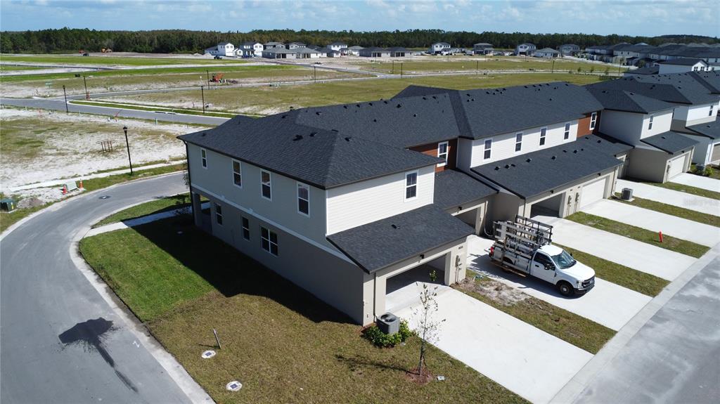 4806 Prairie Preserve Run St. Cloud, FL 34772 - Photo 4 of 21 an aerial view of a house with a ocean view